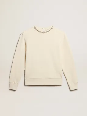 Round-neck cotton sweatshirt in aged white with hand-applied crystals