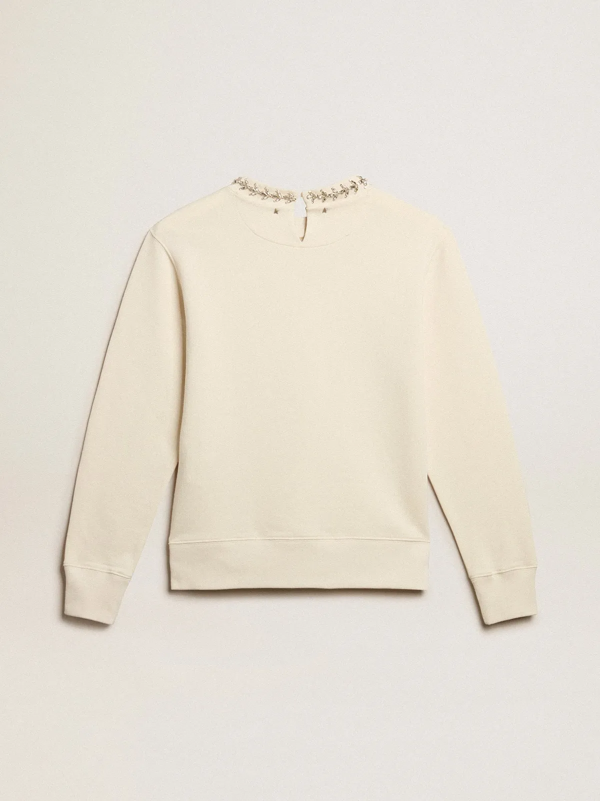 Round-neck cotton sweatshirt in aged white with hand-applied crystals